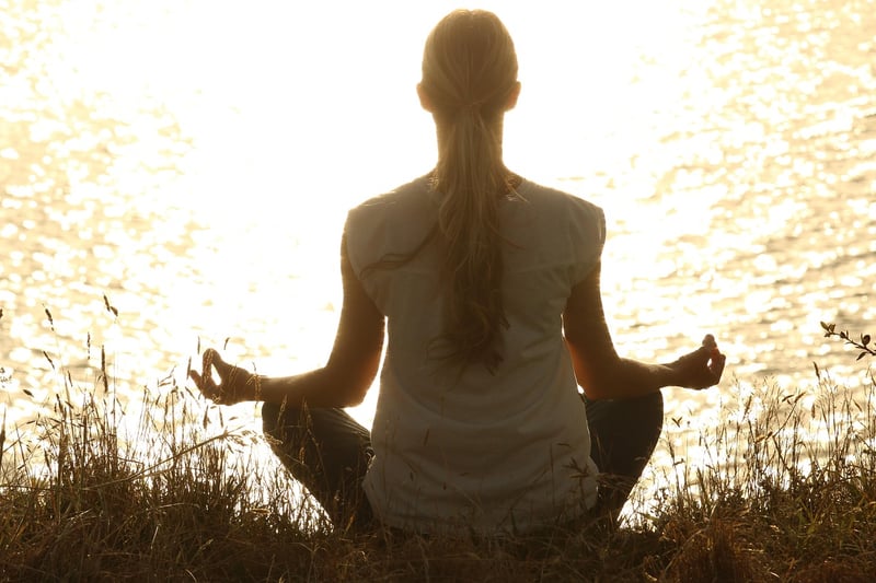 Woman practicing mindful breathing